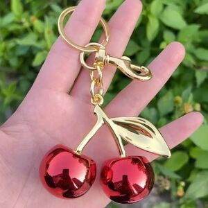 Elegant Gold and Red Cherry Keychain